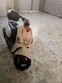 دراجة يابانية • دراجة بوليس • الكوت الشراي