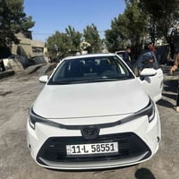 كورلا هايبرد 2025  بيهه جاملغ بارد فق الباقي مكفول  07739360054 155 بي...