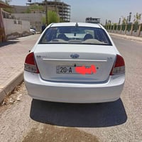 سيراتو 2009 رقم ديالى جاهزة من كلشي مكفولة عدا قطعة صبغ تبريد محرك كير...