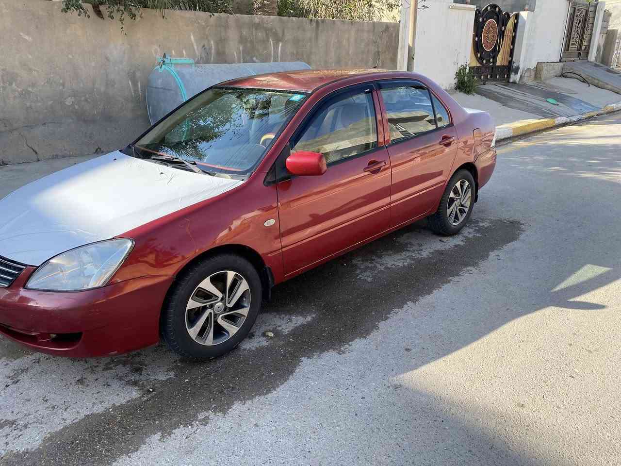 لانسر 10 رقم ديالى كير محرك 2000 بلكارتو جديد لا تنقص ولا تبخر شرط صدر تخم تاير جديد سنويه لل 27  هزه جديده السعر 73 وبيه مجال  ***********مكان ديالى كنعان
