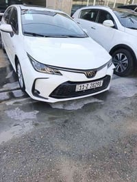 تويوتا كورلا هايبرد ٢٠٢٤ ماشية ٥ الاف باسمي تحويل مباشر فول مواصفات عد...