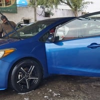 سيارة فورتي 2014 وارد امريكي  رقم بغداد حادث جانبي بدون دواخل ومبدل با...