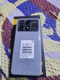 بوكو اكس٦برو g5ذاكره512 جهاز كفاله من خدش ألعاب تصوير فول مواصفات مراو...