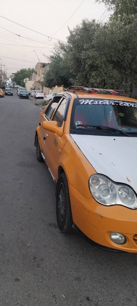 سيكي تكسي مديل 12محرك كورلة سيارة جاهزة مال شارع ما بيها نقص رقم انكليزي هزة جديدة سنوية الي 32 شرط وكالة وتحويل للبيع او معارض *********** بي واتساب السعر 38$
