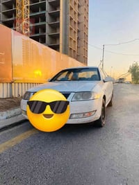 نيسان فيرسا زركه وارد امريكي موديل 2013 باسمي مكاني بغداد وهذا رقمي 07...