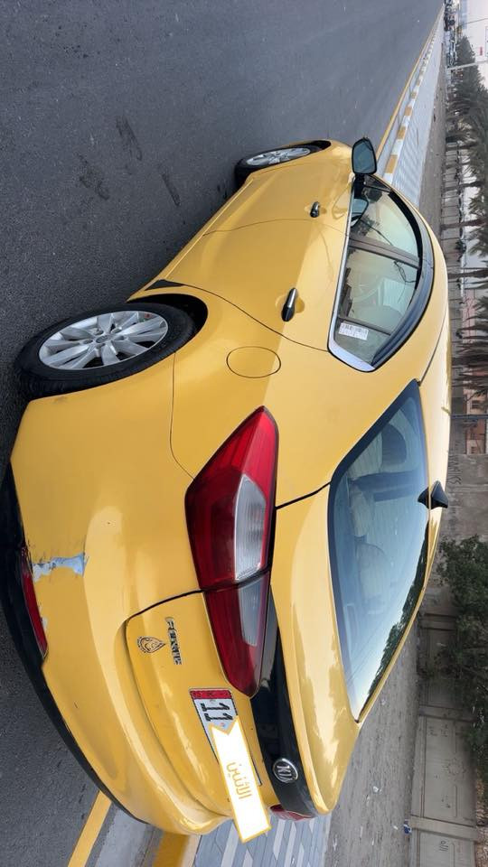 كيا فورتي 2014 وارد امريكي صور الحادث بالمنشور ، السياره بدون ايرباك وبدون تبديل ، محرك وكير وتبريد خير من الله ، السياره بأسمي مكانها بغداد 
للاستفسار ***********
