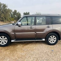 باجيرو 16 الون قهوائي سياره مكفولة من الضربه والتبديل بيهه بارد قليل ش...