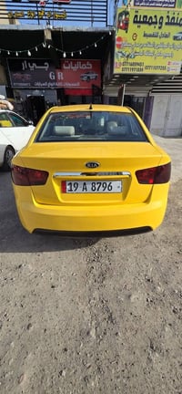 كيا فورتي 2011 السعر 82 ورقه وبها مجال بسيط ومكان بغداد.07704294908