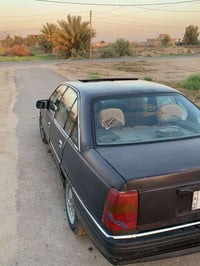 اوبل ١٩٩٠ • محرك ٢٠٠٠ • فتحة كهربا