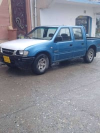 سڵاو ڕێز جەماحەت ئەم پیکاب ئیزوزیمان هەیە بۆ فرۆشتن مۆدیل  2002 ڕەقەمی...