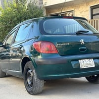 بيجو فرنسي 2005 ماشيه 56كم السيارة جديده بس بيه بعض الملاحظات بالكشر ج...