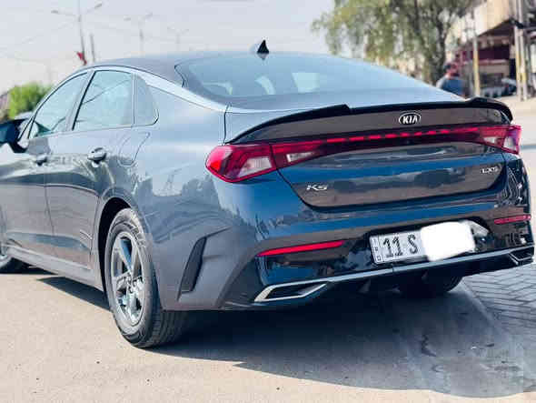 ‏K5 2021
رقم بغداد جديد باسمي
فول مواصفات عدا الفتحه 
بصمه 
تحديد مسار 
تحكم ذاتي  
رادارات
سايد بريك دكمه 
اوتو هولد
تشغيل عن بعد
توقف ذاتي 
اربع وضعيات قياده 
اربع عدسات
محرك 1.6 تيربو 
وبعد بيهه مواصفات 
السعر 143 
اللاستفسار اتصل على الرقم : ***********
