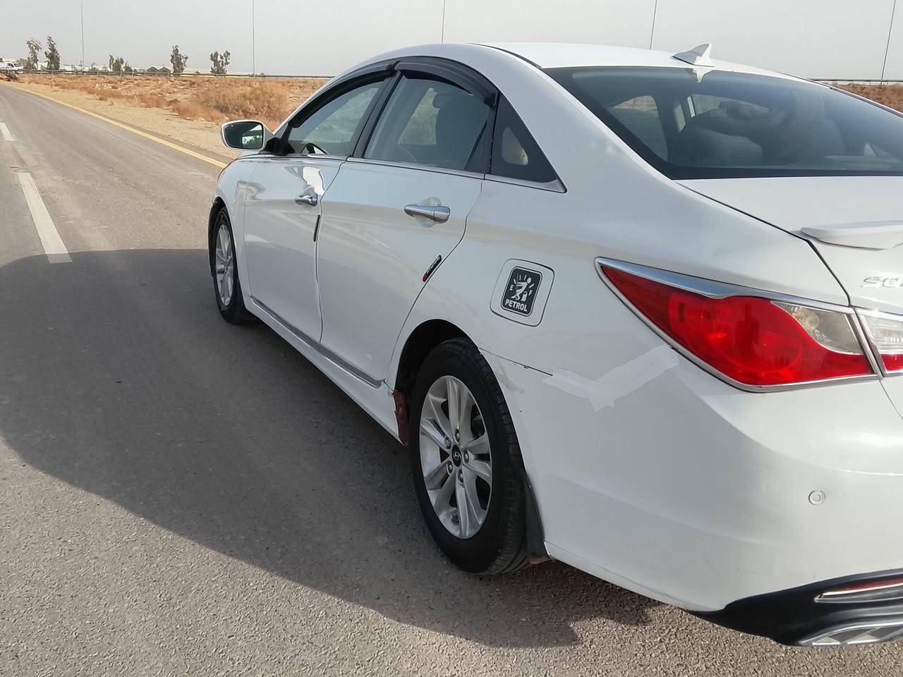 سلام عليكم من رخصت الادمن للبيع سوناتا مضلع موديل 2012 وارد امريكي حادثه بلداير مال  جاملغ الخلفي بدون دواخل وبيه اربع قطع صبغ كله ليبل واحد كير ومحرك وصدر خير من الله محرك 2400 جيدي اي رقم انبار انكليزي سعر 105 وبيه مجال مكان السياره فلوجه النساف غير متواجد ع الفيس ***********
