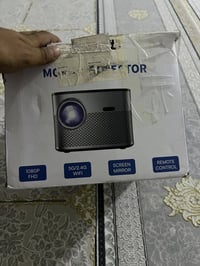 بروجكتر محمول • ١٠٨٠P FHD • عرض شاشة لاسلكي