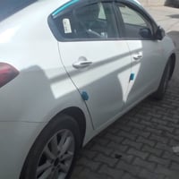 كيا سيراتو خليجي سياره كفاله عامه كير ومحرك بس شوي  بيها كرتات  مري شف...