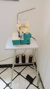 اوفر كوكي ٣خيط • نضيفه • بحاله الشركه