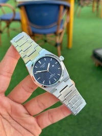 تيسوت • ساعة • رجالية