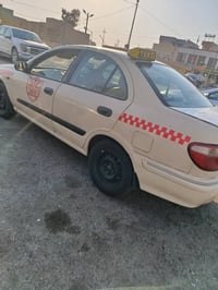 صني • تاكسي • ٢٠٠٣
