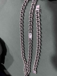 زنجيل وسوار فضة البيع وزن ٣٥٥ غرام    07726679929