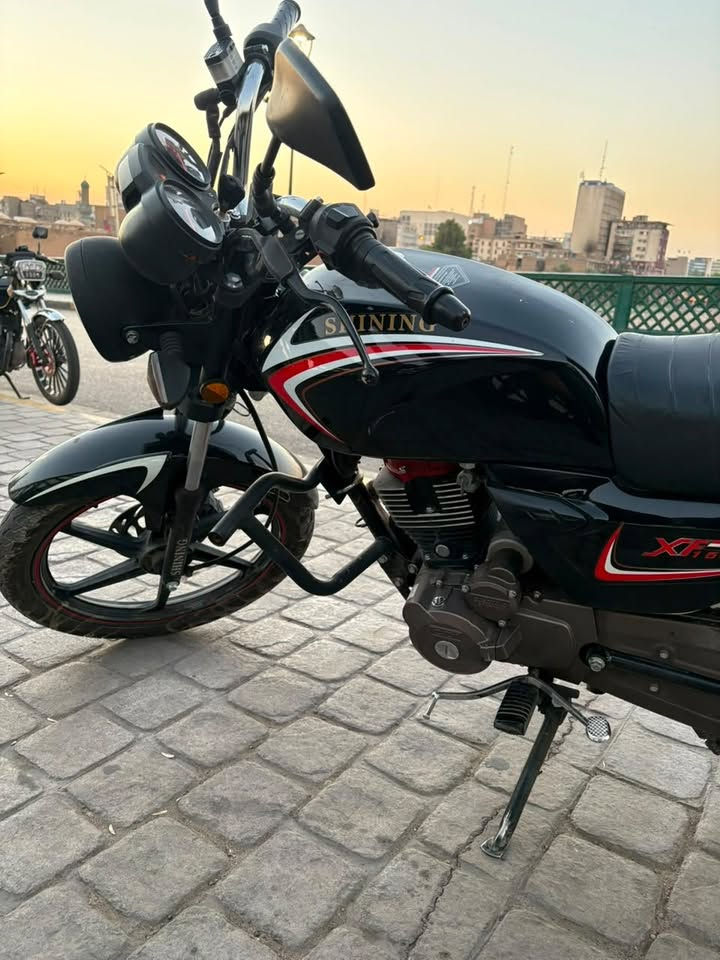 شاينك موديل 23 مكينه خير من الله دراجه قويه ومحترمه بيه بك لايت مكسور وجاملغ معقوج بس تشتغل نكره سلف ترايك للبصره 
دراجه رقم وسنويه بأسمي تحويل شوكت متريد السعر خاص الرقم :***********واتساب فقط
