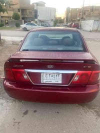 أوبتما 2004 رقم بغداد بسمي مكينة وكير  كلة مكفول تبريد ثلج حدادية امام...