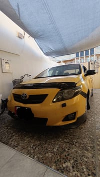 للبيع كورولا موديل 2009واردامركي رقم بغداد بيه بنيد+جاملغ السعر 100 اي...