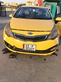 كيا ريو موديل 2012 مضلع   رقم بغداد الجديد مصفره غرامات وهيئه  محركها ...