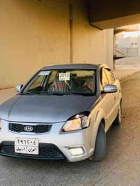 كيا ريو 2012  كير محرك شرط  محرك 16  توماتيك  اشاير مري  فتحه سقف  كاب...