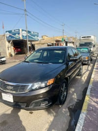 سيارة اوبتيما موديل 2009 وارد امريكي سياره جاهزه من كلشي  تبريد تدفىة ...