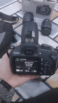 عندي كامرة كانون 1200 مع زومين ومع ملحقاته للبيع الرقم /07503096764