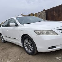 كامري 2008 خليجي ابيض  رقم بغداد  شاشة كامره تحكمات ستيرن صبغ حزام اثر...