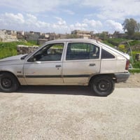 سيارة كاديت للبيع حجم16 كارربون بيها مكينة شرط لا صرف ولا نفخ كهربايات...