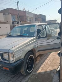 ٠سياره مسبوشي بيكم موديل 1996 رصاصي رقم بغداد بأسمي مكفوله من كل شيء و...