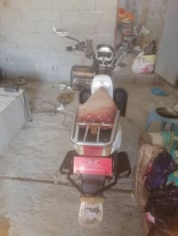 دراجة كهربائية • بطاريات منتفخة • شاحن