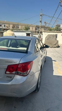 شوفرليت كروز خليجي  رقم بغداد بأسمي موديل 2010 لون سلفر   تبريد ثلج سو...