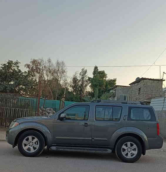 ‏السلام عليكم نيسان باثفندر وارد امريكي موديل 2009 لون رصاصي حادث جاملغ الامامي اليسار ول بنيد شواصي مكفوله ولغود مكفوله فول مواصفات دشبول ارمادا فتحه سقف شاشا كامره خلفيه حساسات خلفيه سياره احلا من الصور مكينه وكير مكفولات مكينه 6سلندر 4000 تبريد مركزي 3قطع ثلج سياره عائليه سبعه راكب 4X4 فور ويل تحكم ستيرن جهتين كرسي السائق كهرباء صدر امامي خلفي جيد سياره جاهزه رقم بغداد دولي بسمي تحويل مباشر السعر 109وبيها مجال بسيط الاتصال *********** مكان بغداد 
‏ بغداد

