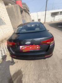 اوبتيما للبيع وارد كوري رقم انكليزي السياره مكفوله عدالصبغ الكوري ما ي...