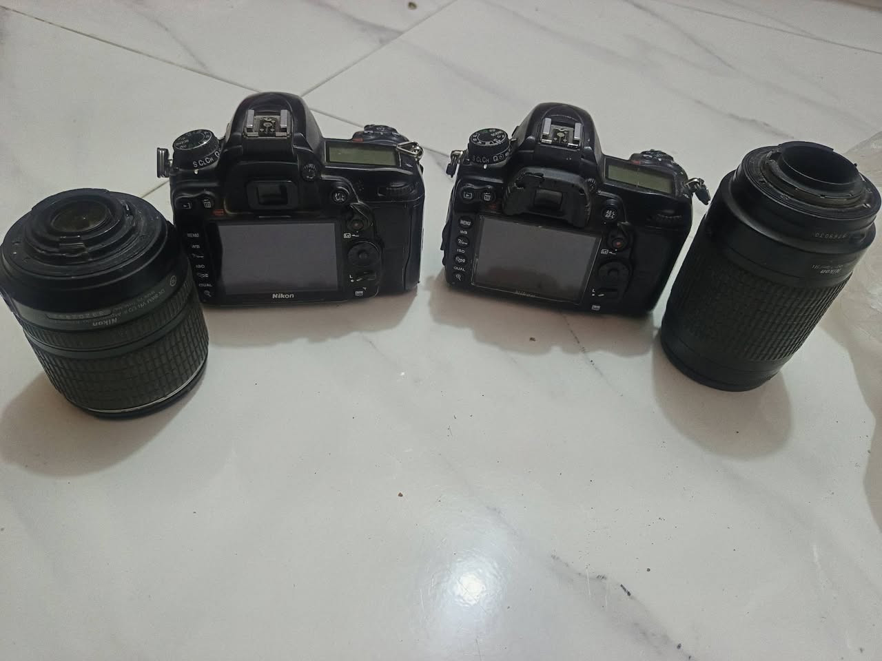 نيكون D7000 نقص بطاريات فقط للبيع السعر 400 الف مكاني الشطره م ***********
