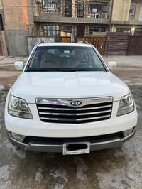 كيا موهافي 2011  رقم  بغداد  سيارة بيهه بارد بابين (خلف السائق + خلف ا...