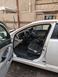 كيا اوبتمه٢٠١٣ امريكي ماشية ١٣٤ ميل صبغ بس باب وجاملغ بدون دواخل  حادث...