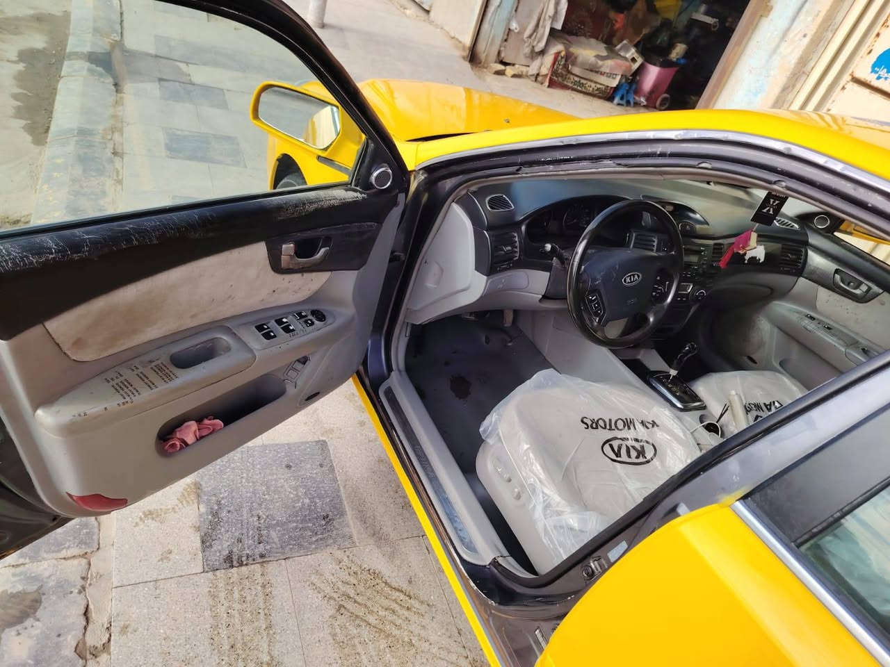 سلام عليكم اوبتيما أمريكي  موديل 2007 ضربته جاملغ وبانيد صبغت جديده رقم ذي قار نكليزي بسمي مكينه 6 سلندر كير حداديه تخم تاير تبريد ثلج جاهزه كل نقص مابيه سعره 90 وبيه مجال مكاني ناصريه قضاء شطره رقم الهاتف ***********
