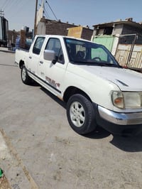 بيكب نيسان • ٢٠٠٢ • توماتيك