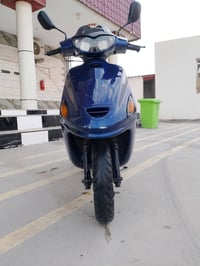 دراجة فراشة • محرك مفتوح مرة • بني منصور