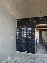 خلفه سراميك ولوح بورسلين وجميع انواع الأرضيات للاستفسار 07827045825