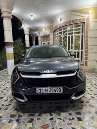 البيع سبورتج وارد امريكي  موديل 2024 رقم  بغداد نكليزي  فحص وهزه كله ج...