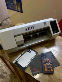 جهاز تقطيع لواسق وتغليف الهواتف ماركه ايدا من انور ابل اخذته كل أنواع ...