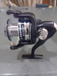 شلعة مكينة صيد حجم 5000 وبكرة خيط مال مكينه 500 متر وشبكة صيد مع هدايا...