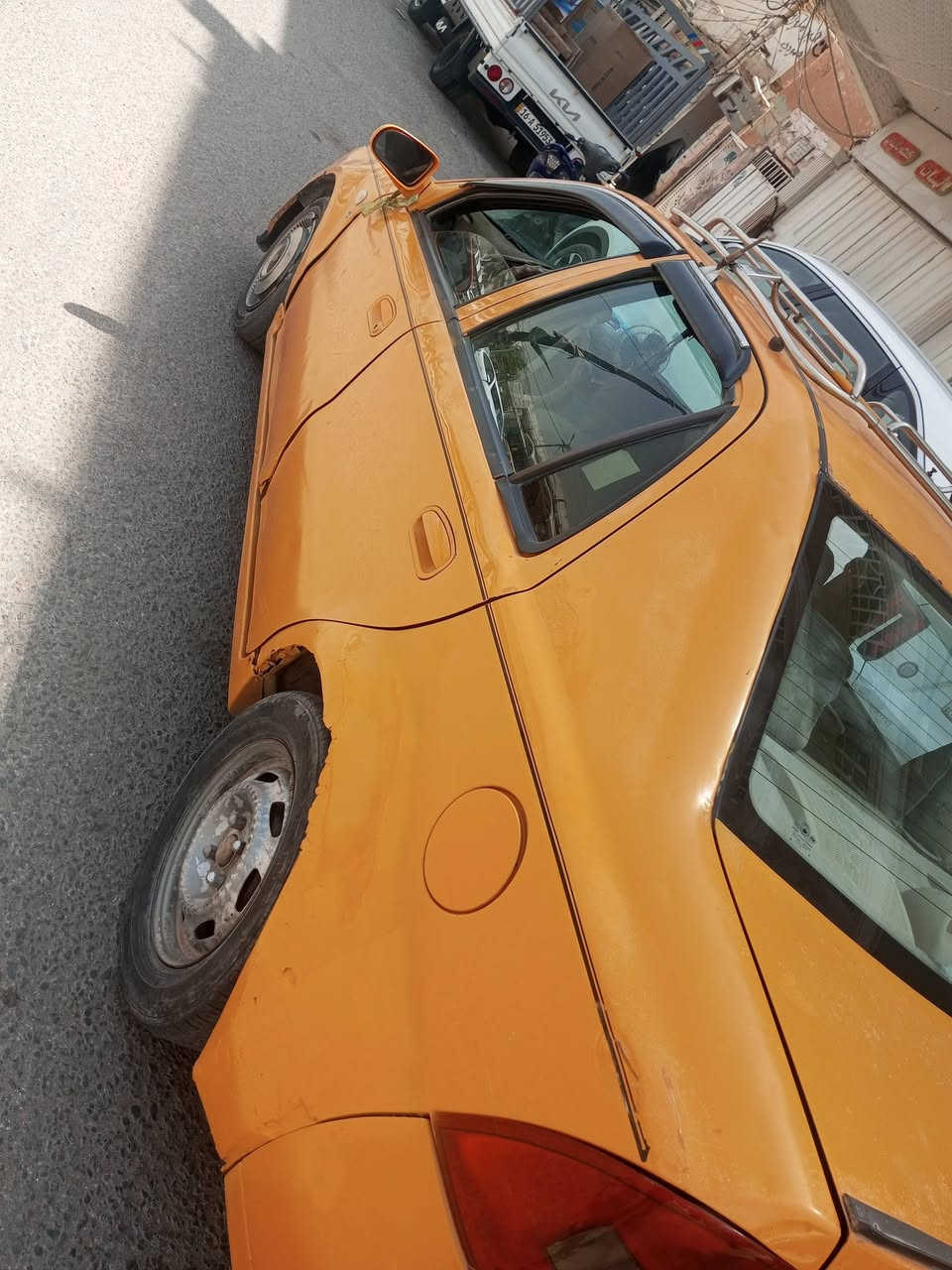 السلام عليكم سياره للبيع جاهزه من كلشي كير مكينه حداديه مصفره هيه وغرامات سنويه جديده راعيه موجود مكان الدوانيه ***********السعر ب20وبيه مجال قليل لشراي
