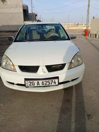 لانسر ٢٠١٠ • اوتوماتيك • تحويل باسمي