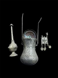 جرة ماء قديمة جدا ( منقوشة ) - العنوان / بغداد / الكرادة / حي الوحدة ش...